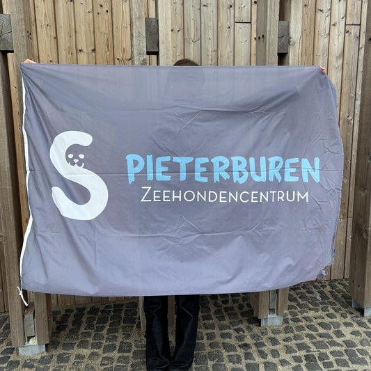 88. Grey/dark blue flag featuring the logo of the Seal Centre (used) nr 1