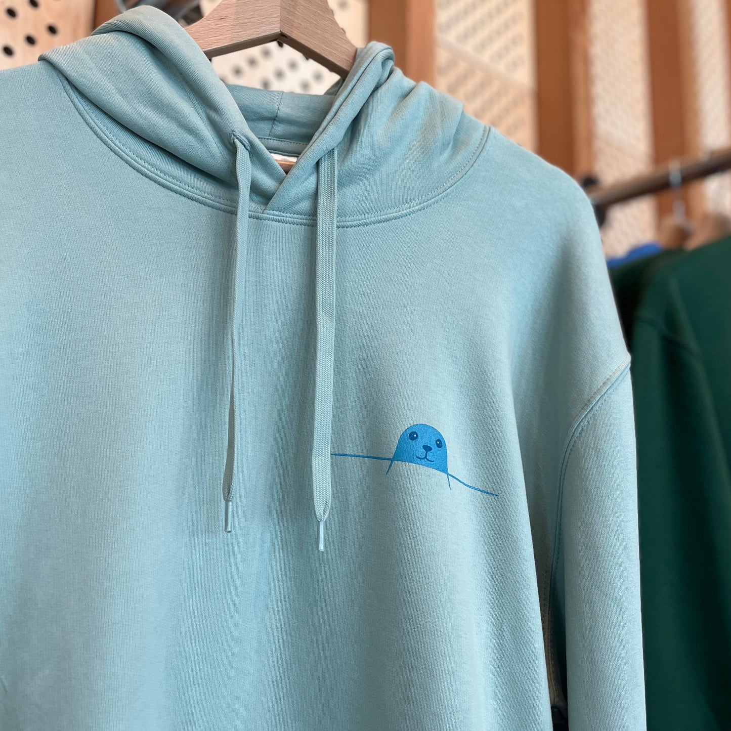 Mintgroene hoodie met zeehond