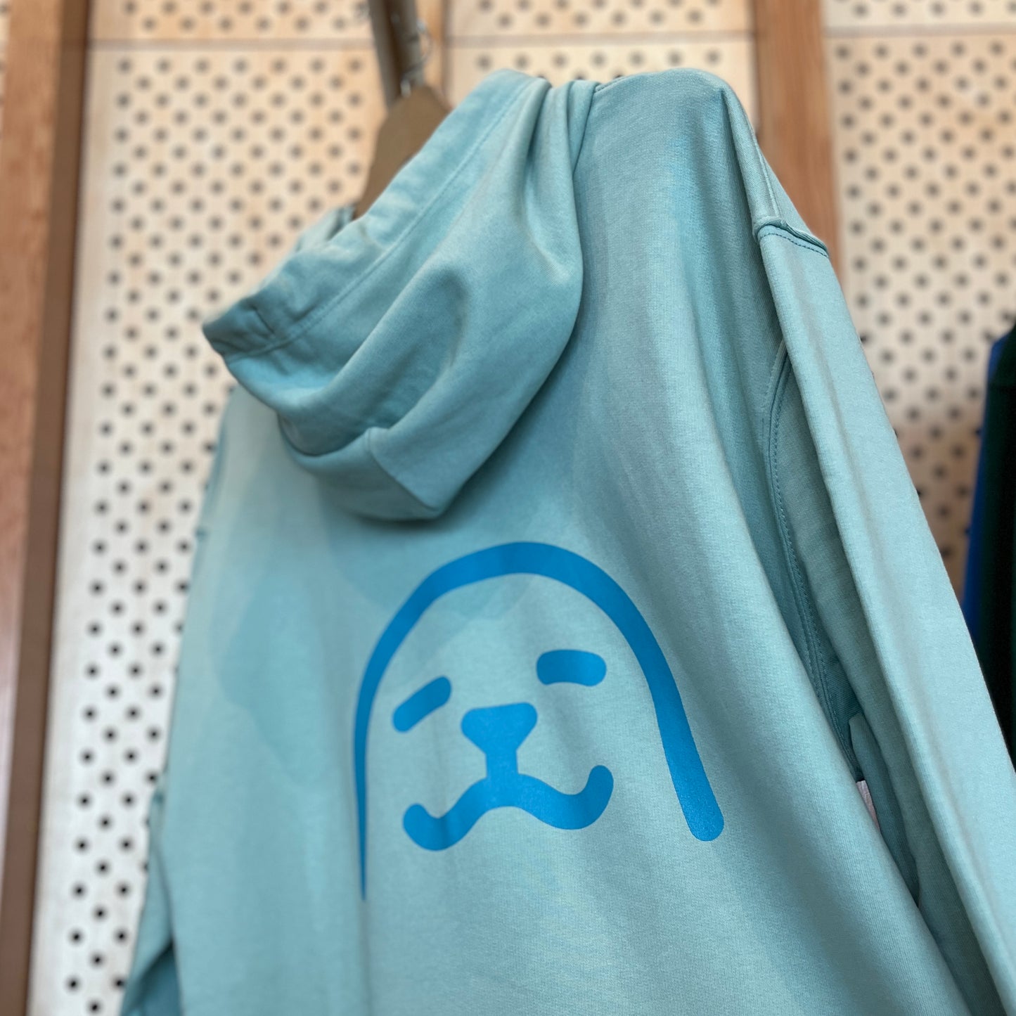 Mintgroene hoodie met zeehond